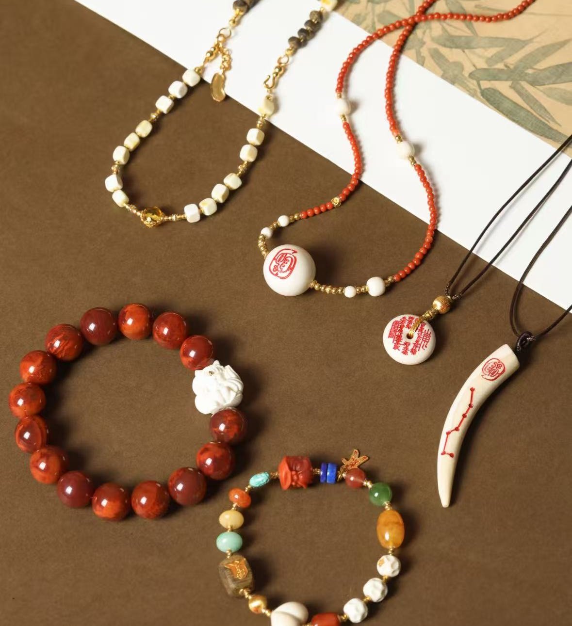 Red agate bracelet with guardian pendant